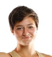 Image may contain: 1 person, smiling, shorts